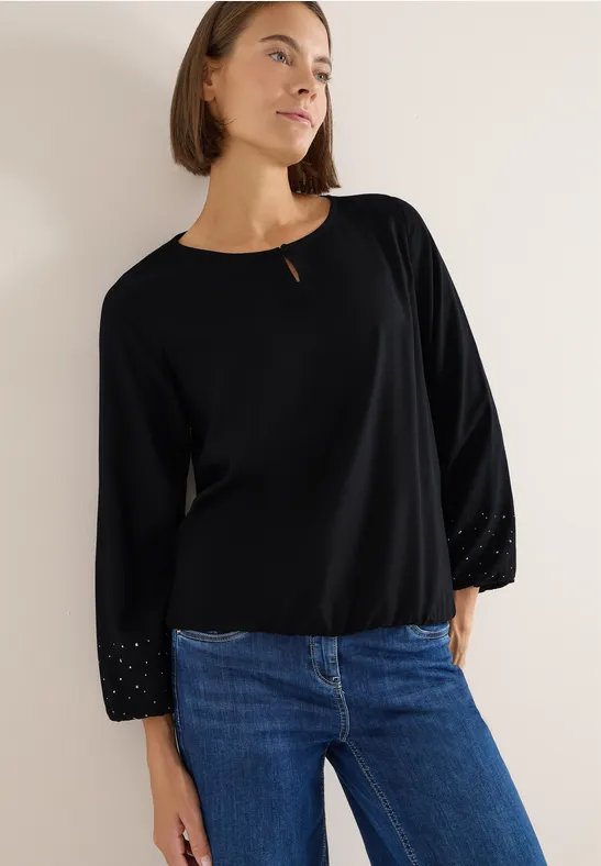 Elegante schwarze Langarmbluse