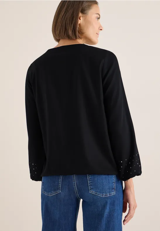 Elegante schwarze Langarmbluse