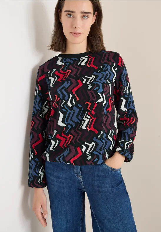 Farbenfrohes, geometrisch bedrucktes Langarmshirt