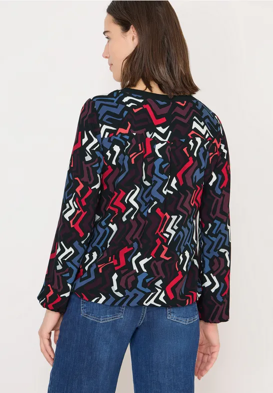 Farbenfrohes, geometrisch bedrucktes Langarmshirt