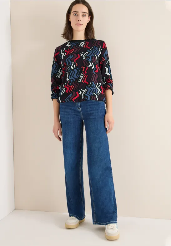 Farbenfrohes, geometrisch bedrucktes Langarmshirt