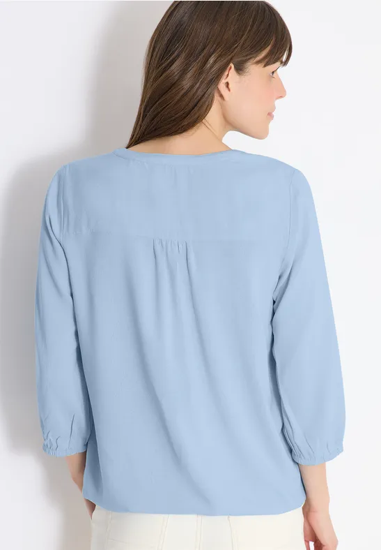 Marineblaue Damenbluse mit Schlitzkragen