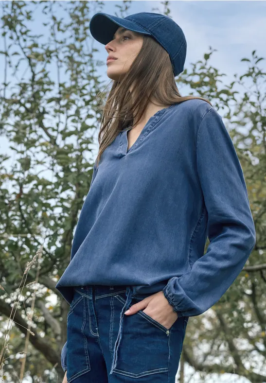 Lässige Denim-Bluse mit elastischem Saum