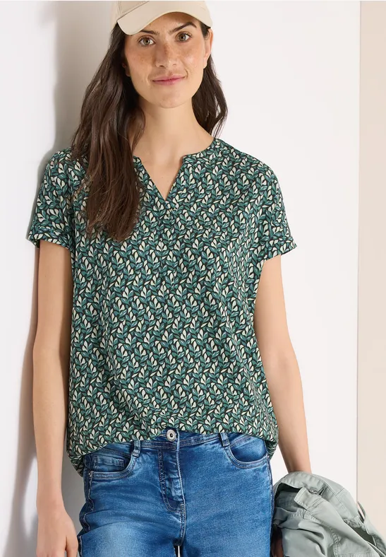 Bluse mit Blätterdruck und Schlitzkragen