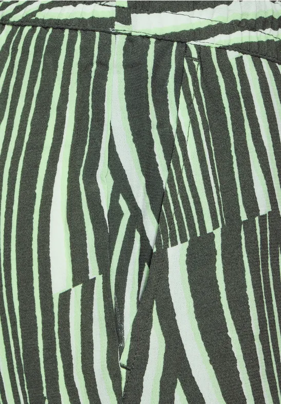 Grüne Hose mit weitem Bein und Muster