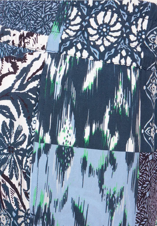 Joggpants mit Patchwork-Print und lockerer Passform