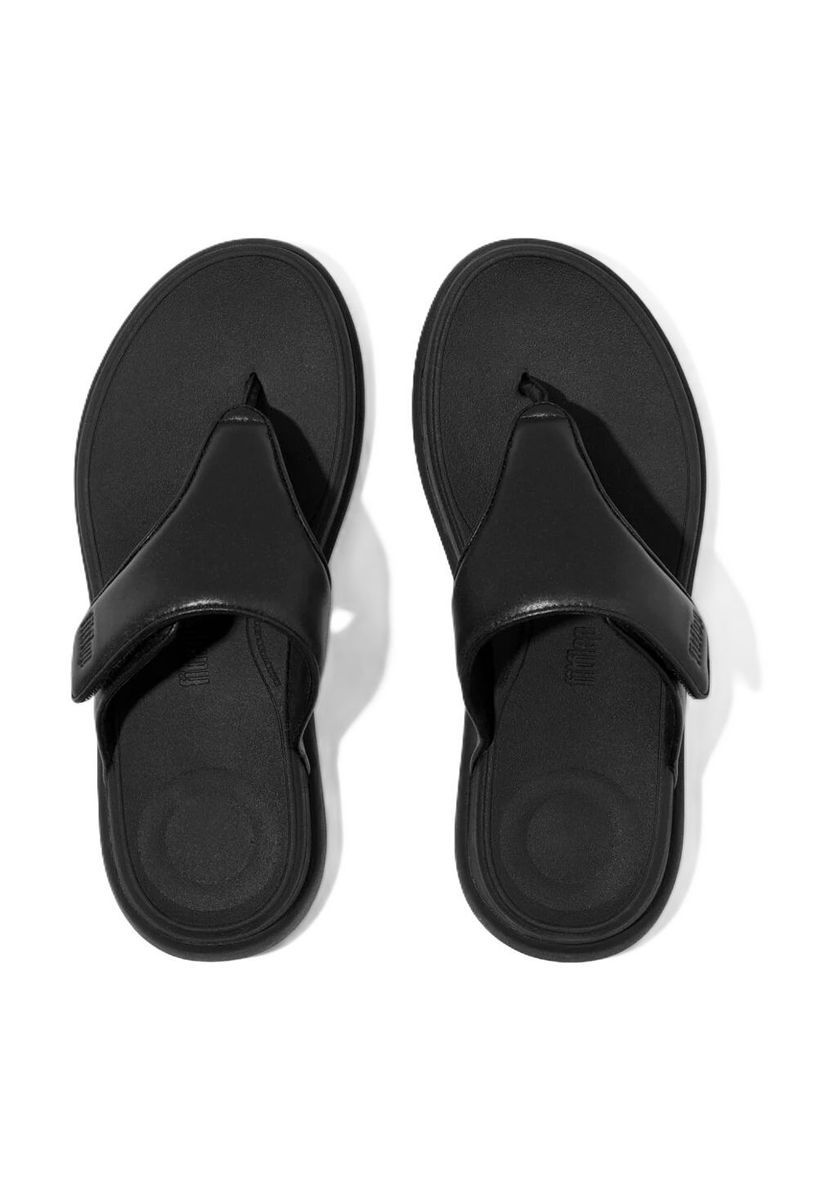 Minimalistische schwarze verstellbare Zehensandale