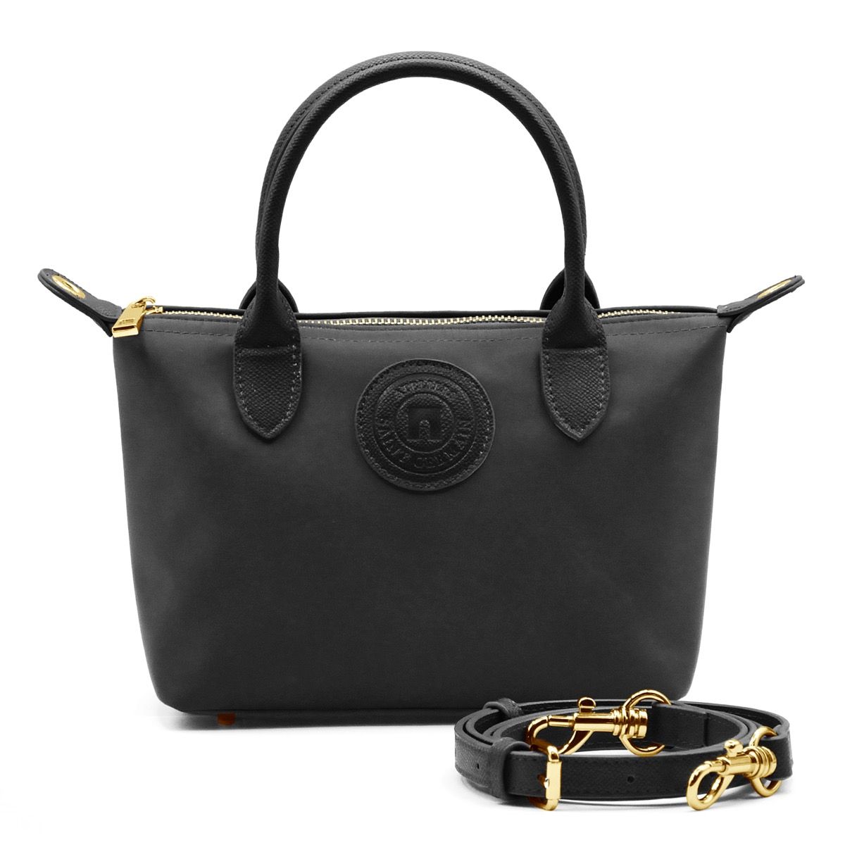 Strukturierte Lederhandtasche mit Henkel und Riemen