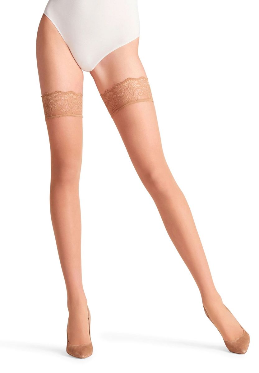 Transparente beige halterlose Strümpfe mit Spitze