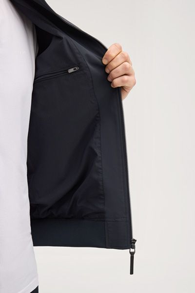 Marineblaue Blousonjacke aus Nylonmischung mit geripptem Kragen und Bündchen