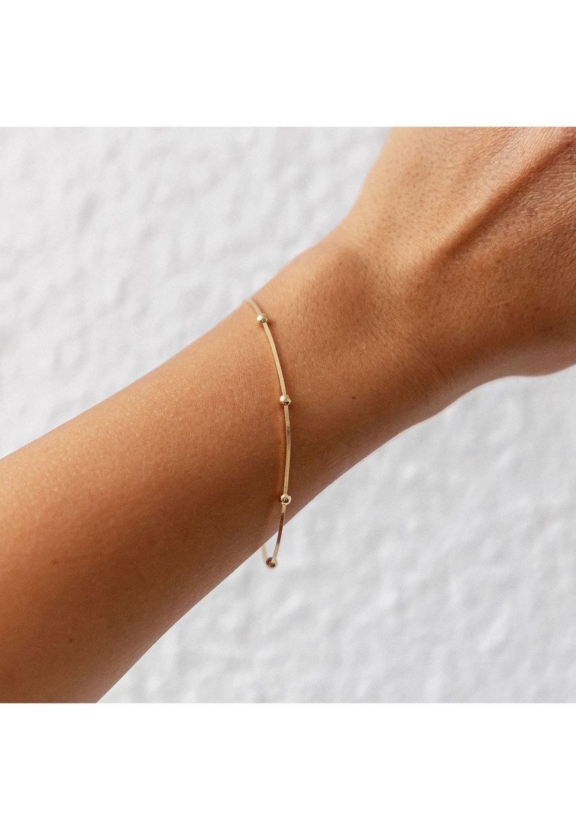 Elegantes goldenes Schlangenkettenarmband