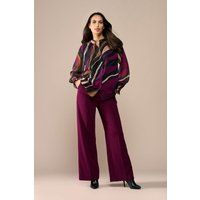 Elegante Bluse mit abstraktem Muster und Schleife