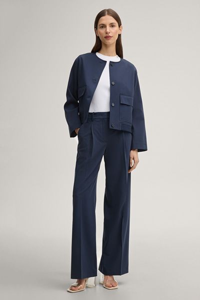 Marc Cain Tonda Weißes Ärmelloses Stricktop mit Logo-Pin