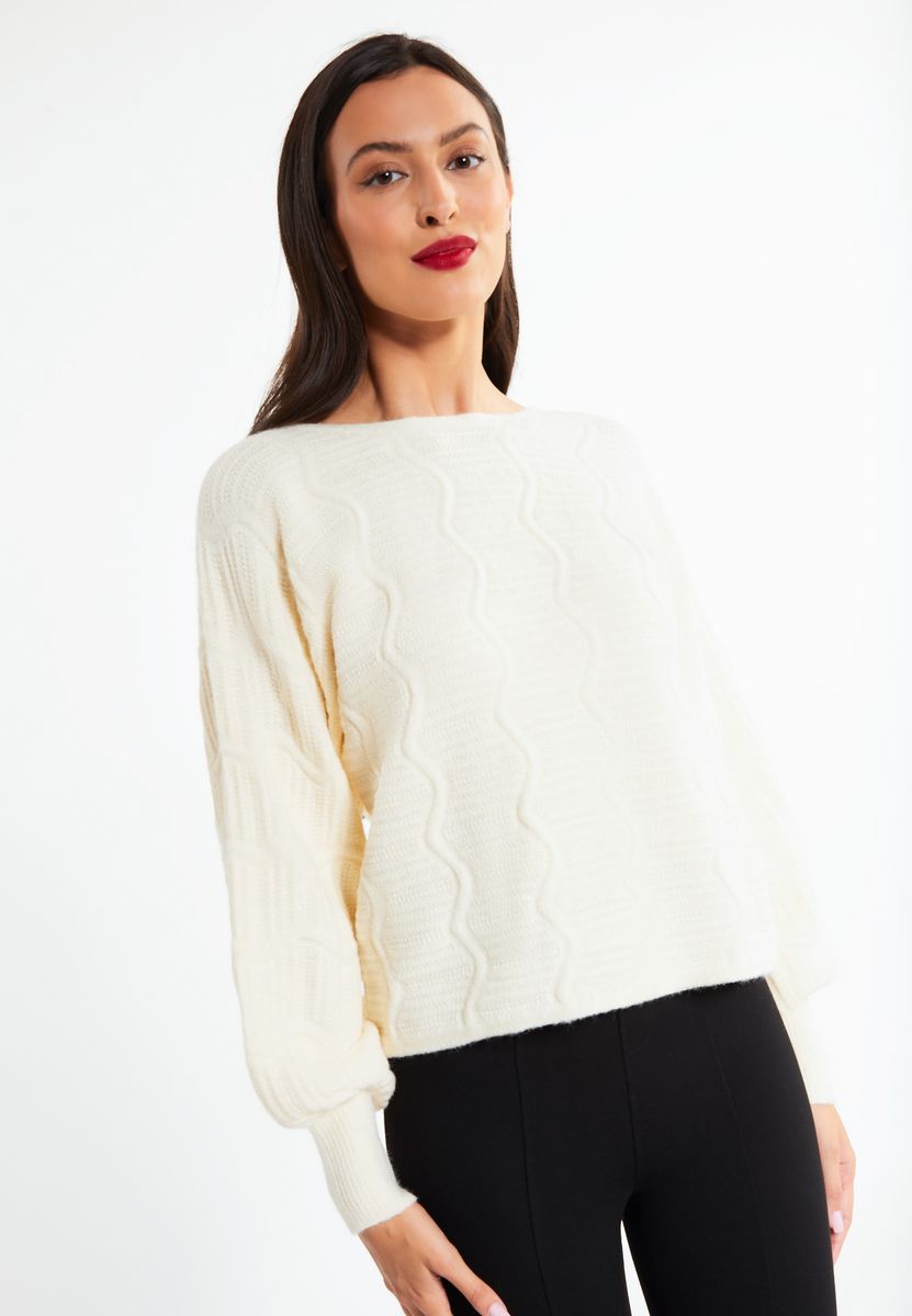 Glitzerndes Strickoberteil mit Wellenmuster