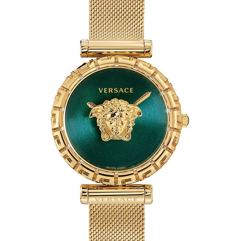Elegante goldfarbene Uhr mit grünem Zifferblatt