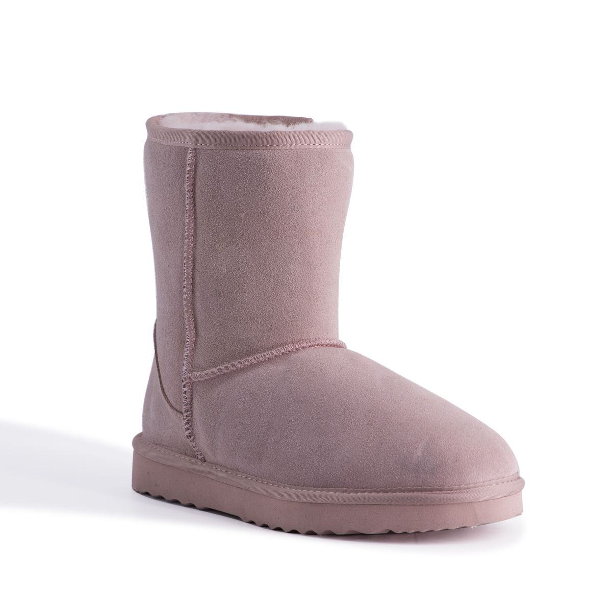 Halblange Lammfellstiefel in blassem Rosa