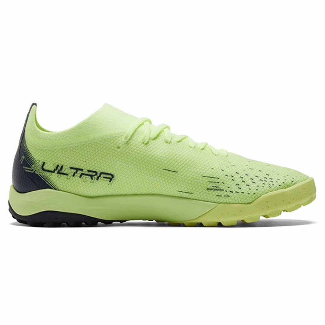 Grüner Fußballschuh für Kunstrasen