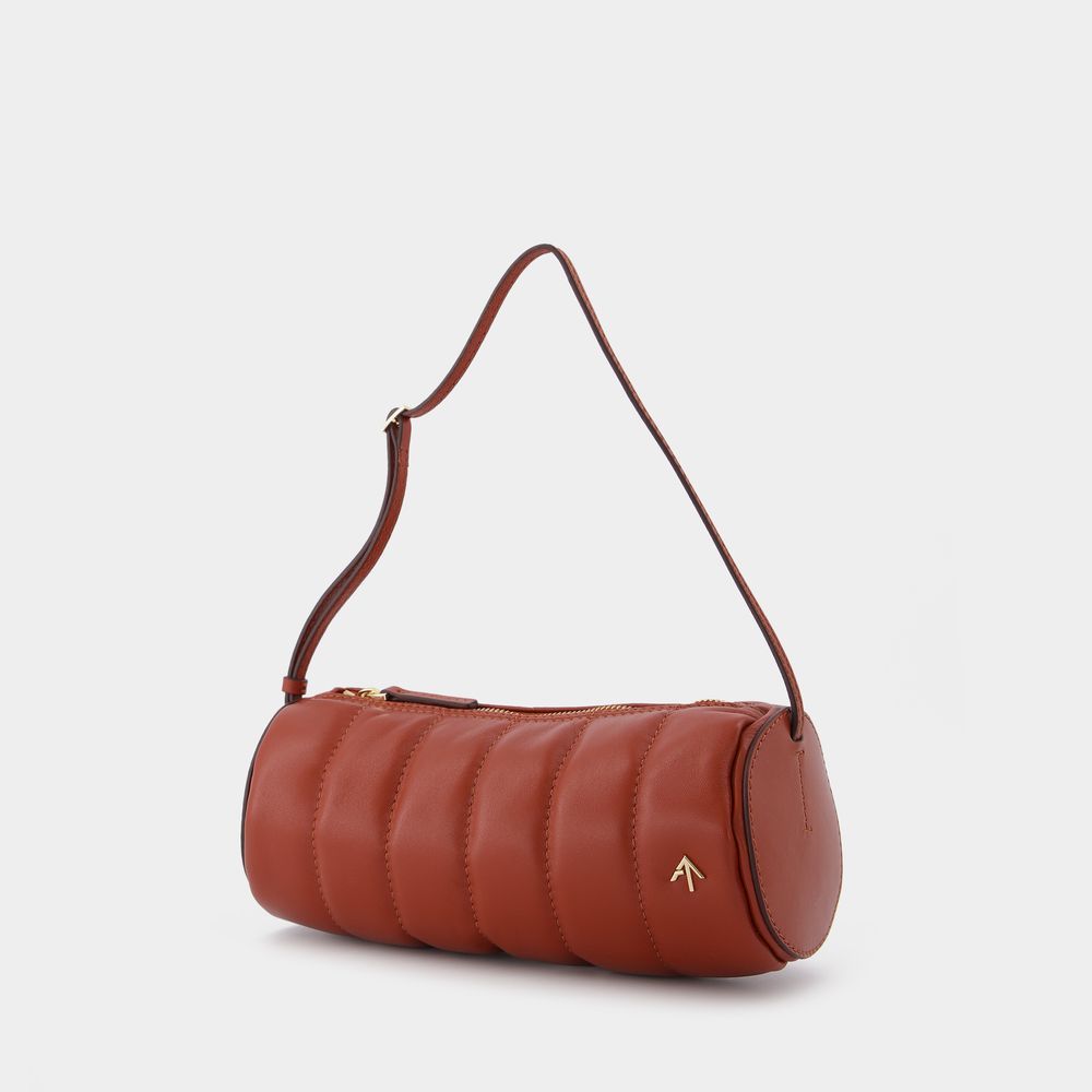 Gepolsterte Zylinder-Schultertasche aus Leder