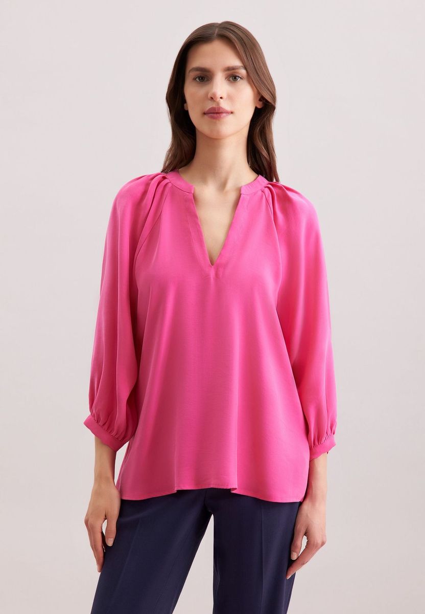 Elegante pinke Bluse mit Ballonärmeln