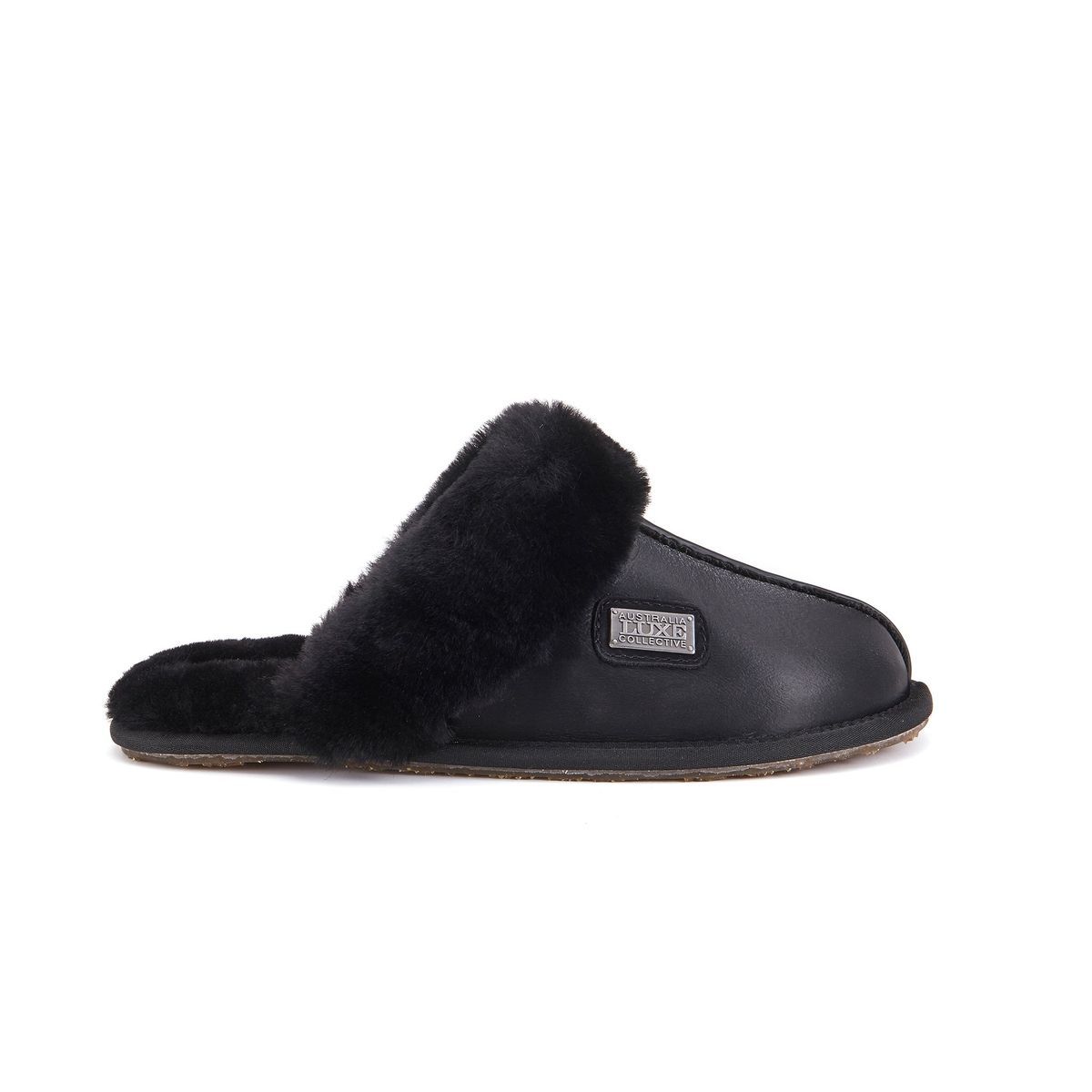 Schwarze Shearling-gefütterte Leder-Slipper