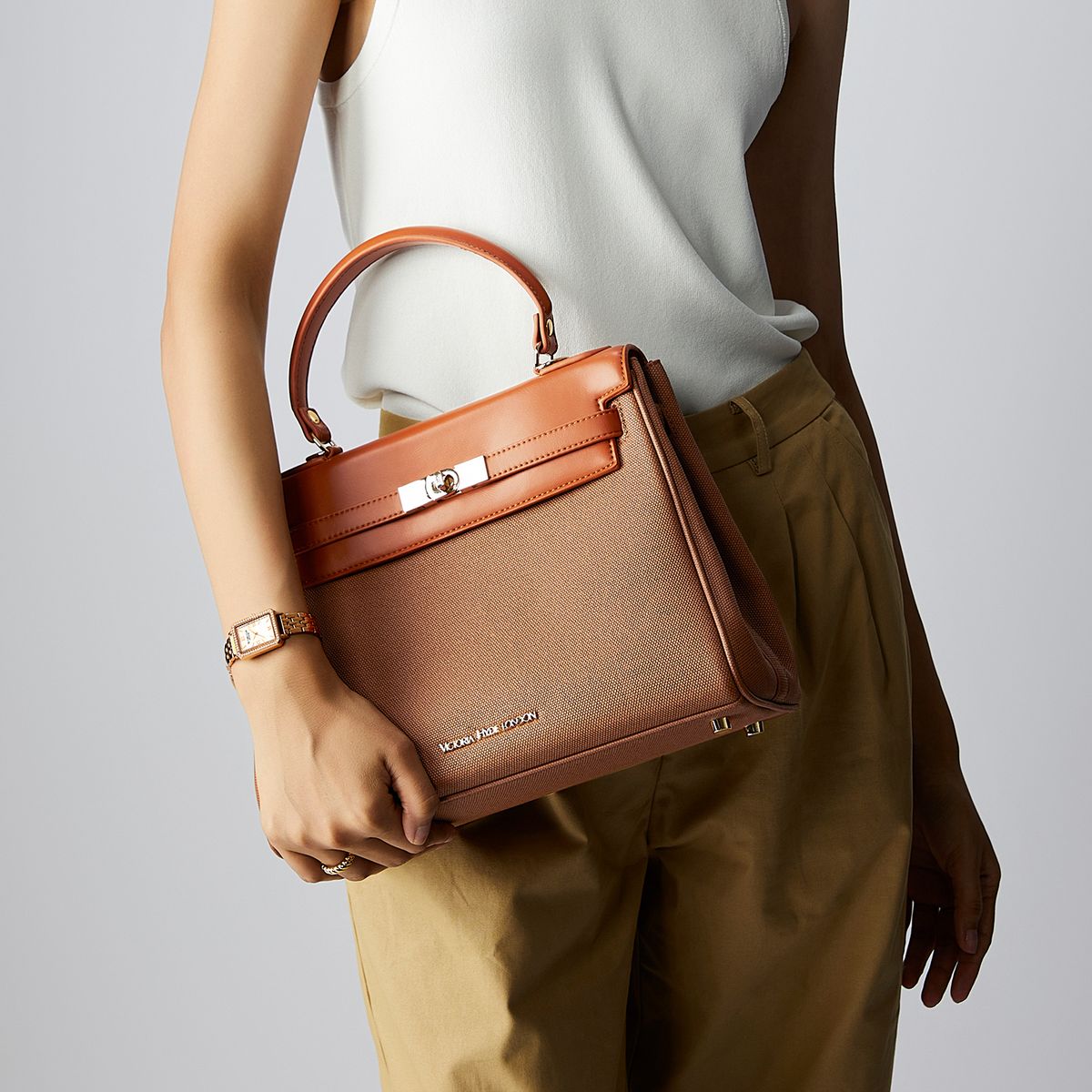 Elegante Henkeltasche mit Umhängeriemen