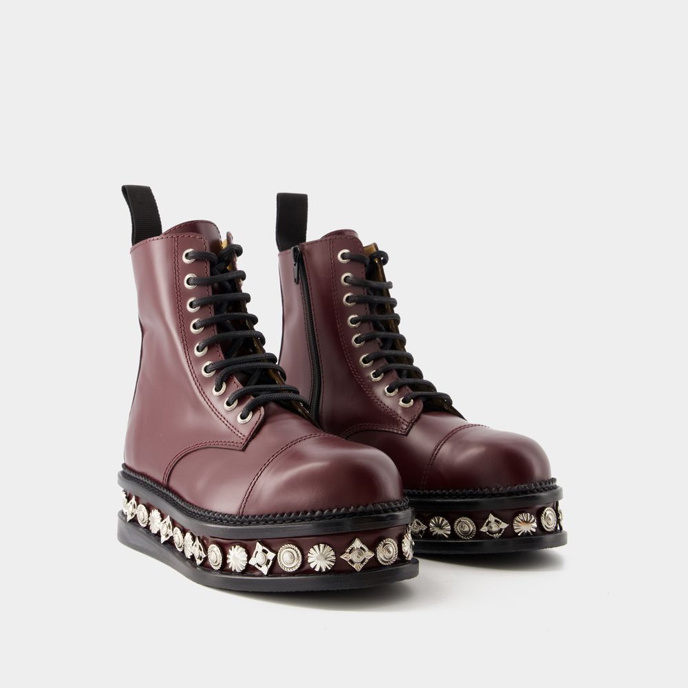 Burgunderfarbene Lederplateau-Stiefeletten