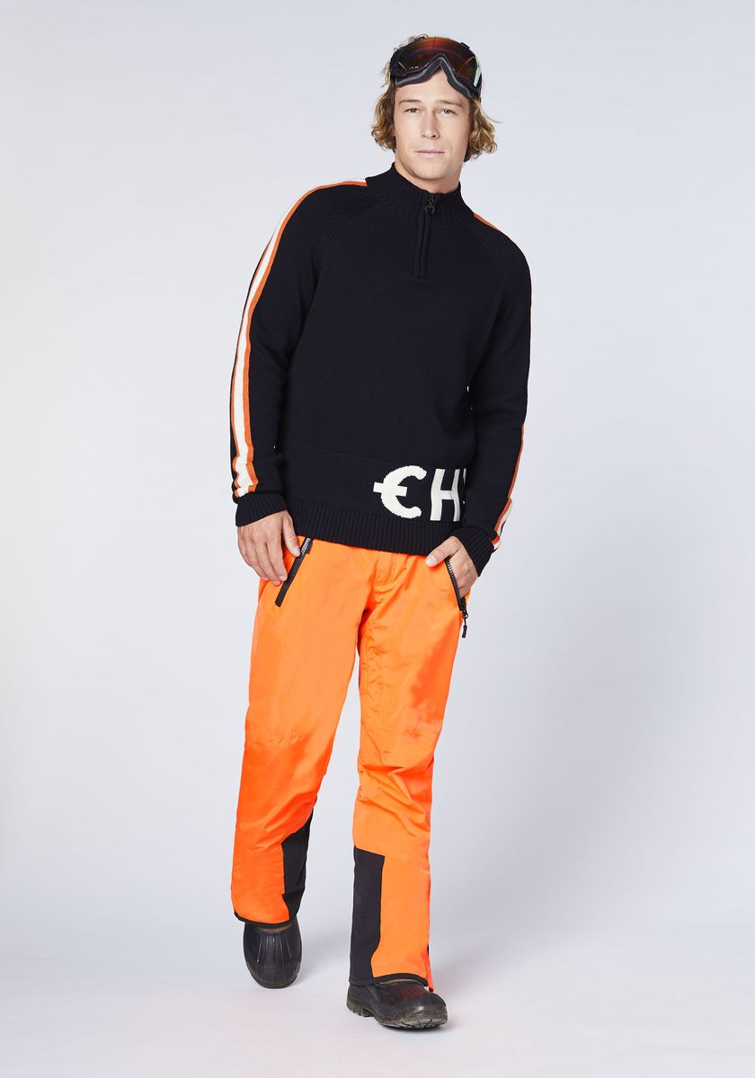 Orangefarbene isolierte Schnee-Skihose
