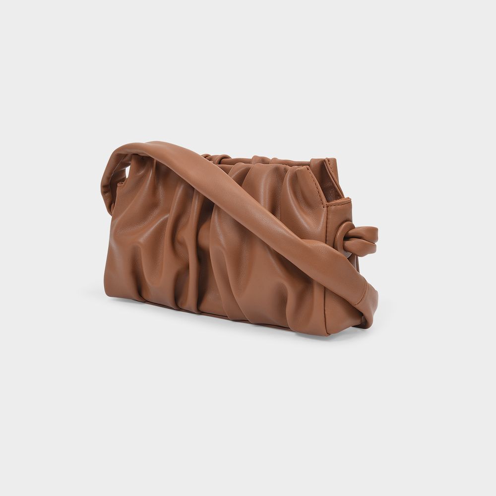 Vague Plissierte Baguette-Tasche aus Leder