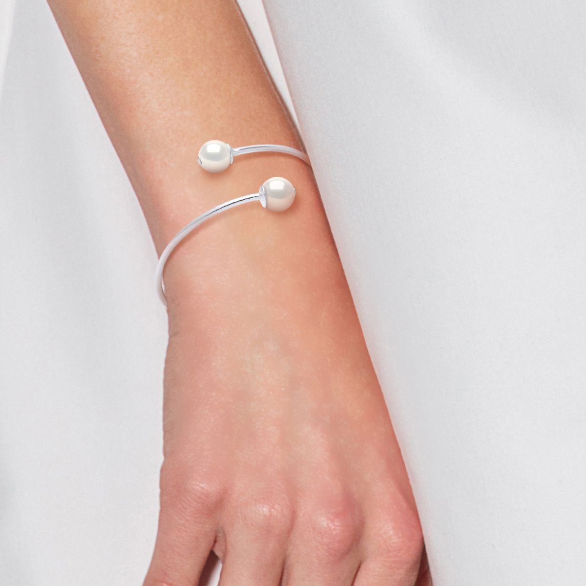 Eleganter Perlen-Bypass-Armreif
