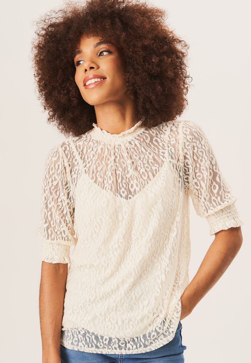 Hochgeschlossene Spitzenbluse mit Leopardenmuster