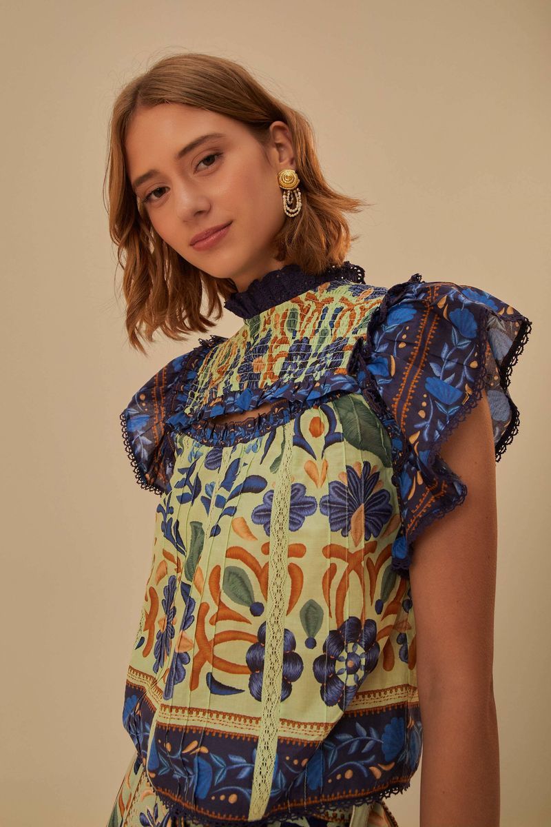 Ärmellose Bluse mit Blumenmuster und Spitze