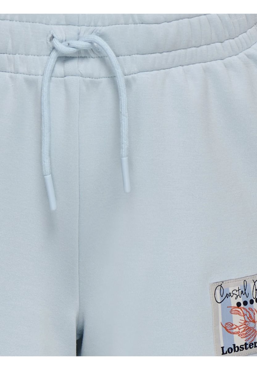 Weiche blaue Mädchenshorts mit Küstenmotiv