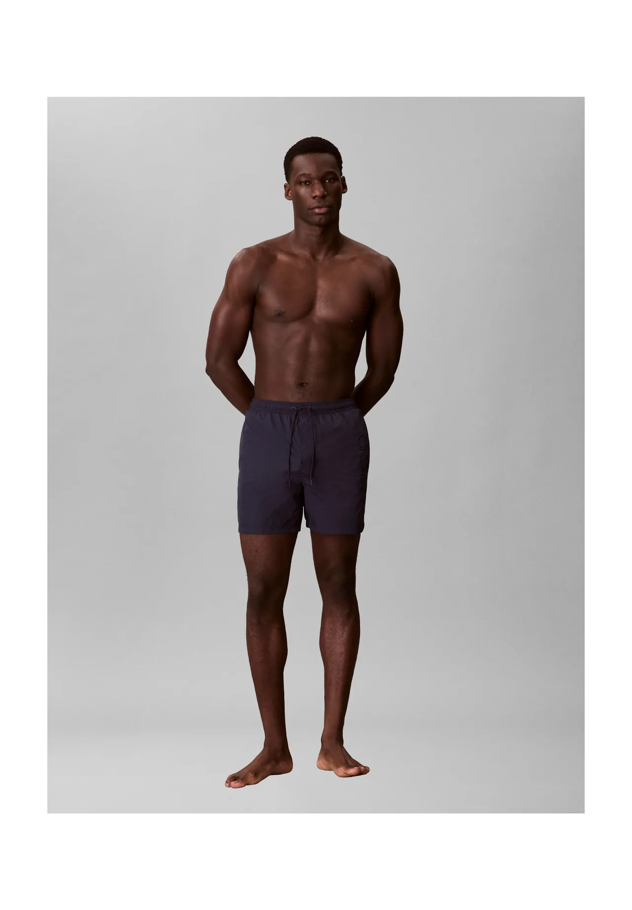 Herren Badeshorts mit Stickerei, Uni
