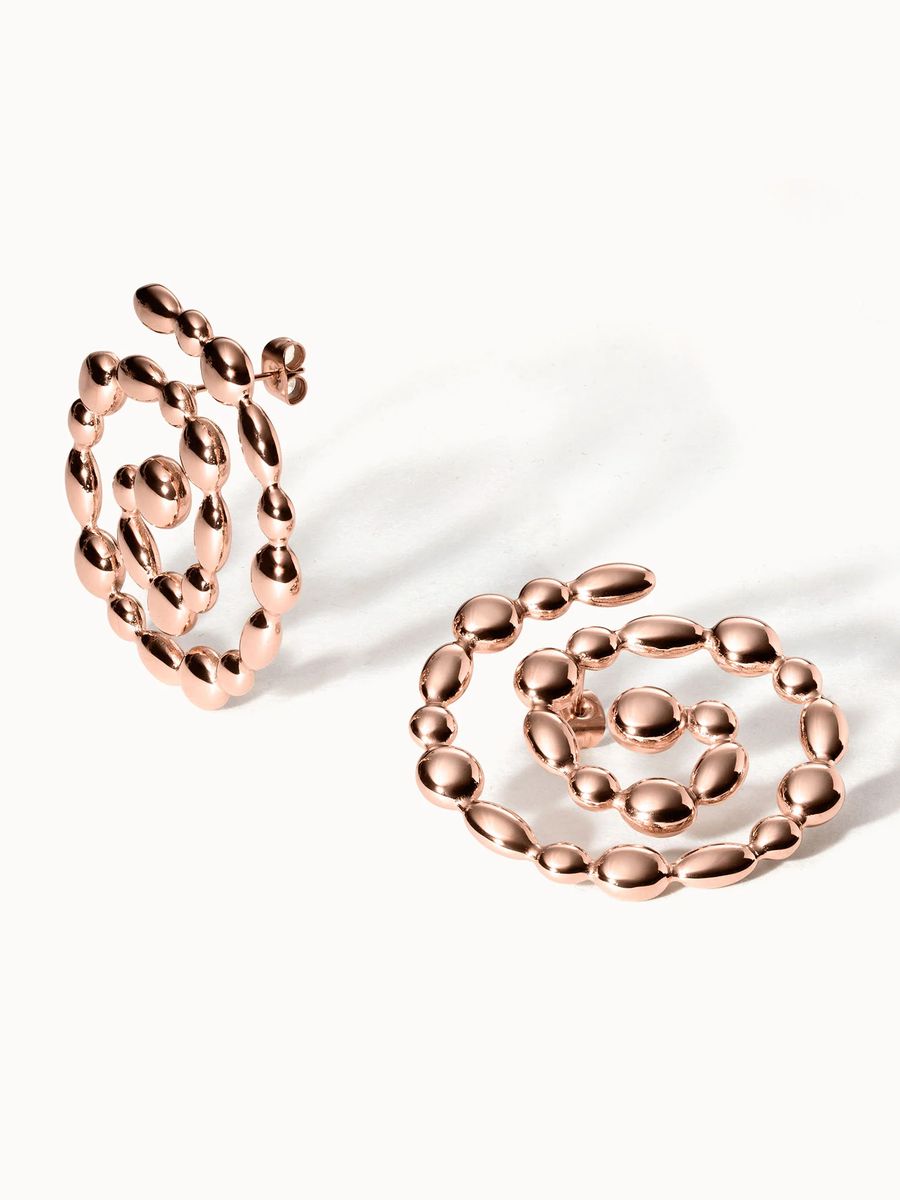 Goldene Swirl Statement Ohrringe