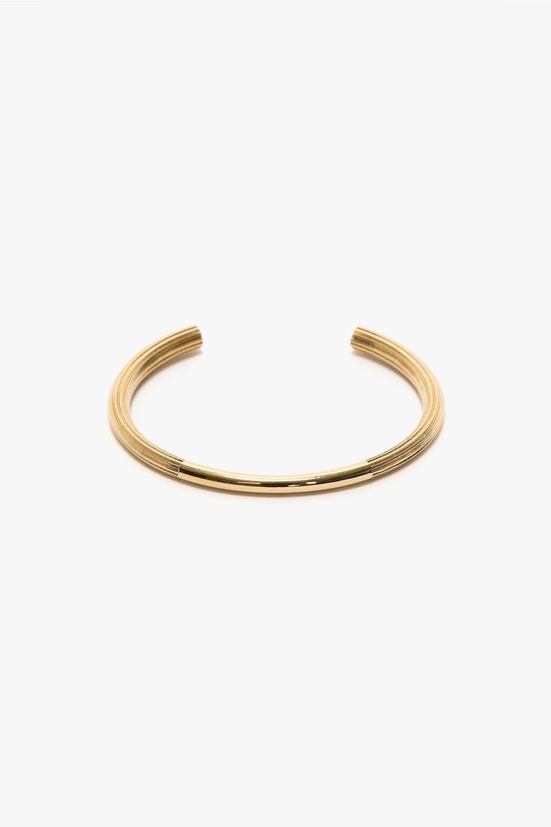 Hellgoldenes Armband im Manschettenknopf-Stil