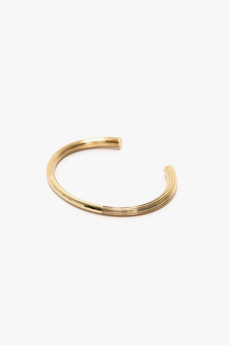 Hellgoldenes Armband im Manschettenknopf-Stil