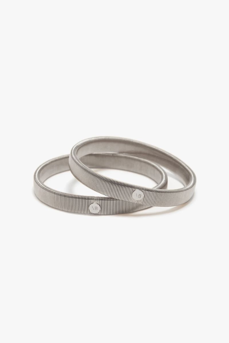Silberfarbene Ärmelmanschetten aus Metall
