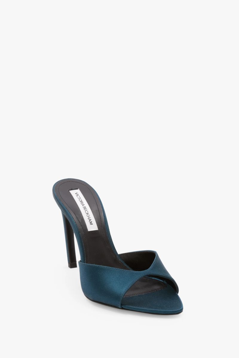 Mules mit offenem Zeh und skulpturalem Absatz