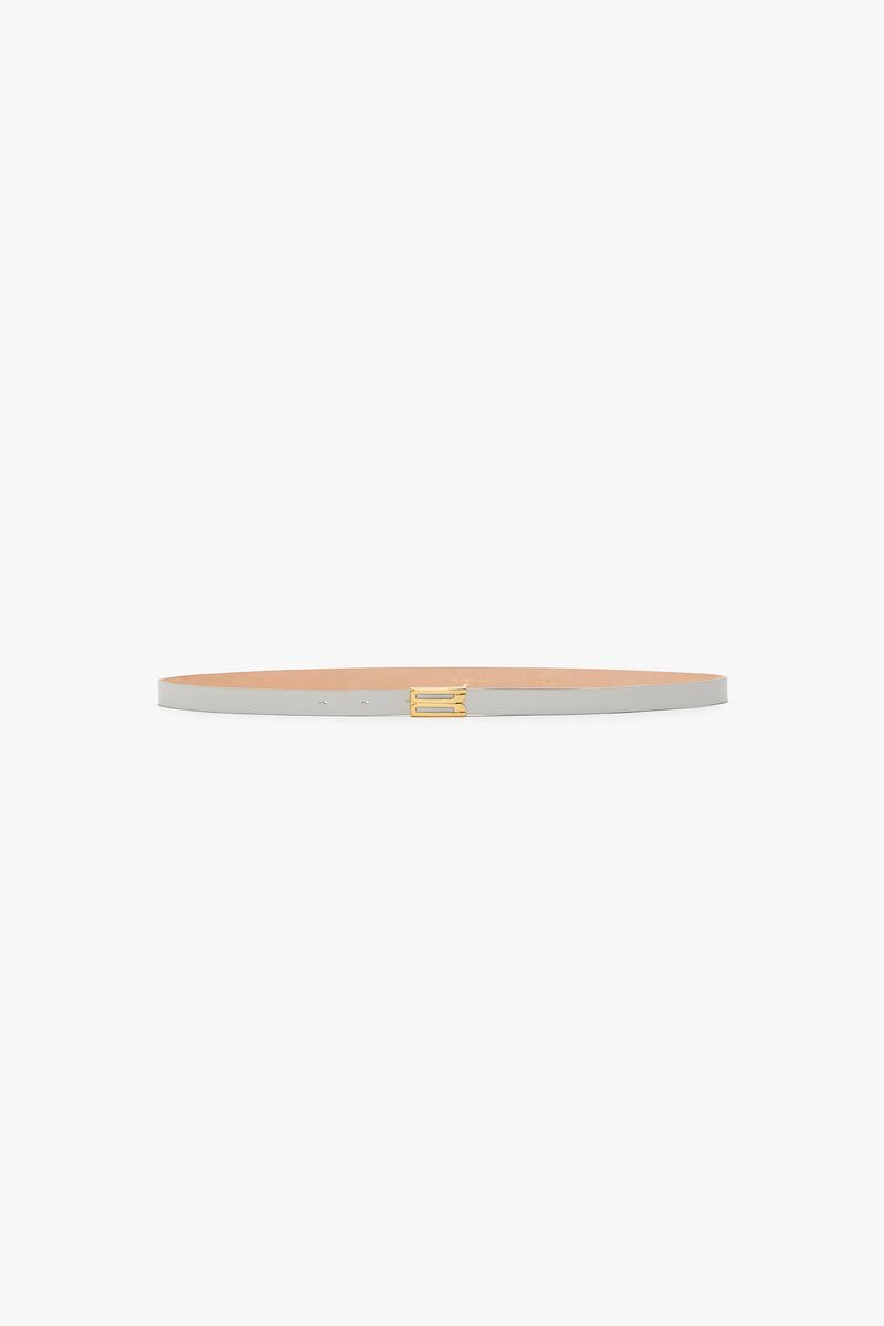 Minimalistischer grauer Ledergürtel mit goldener Schnalle