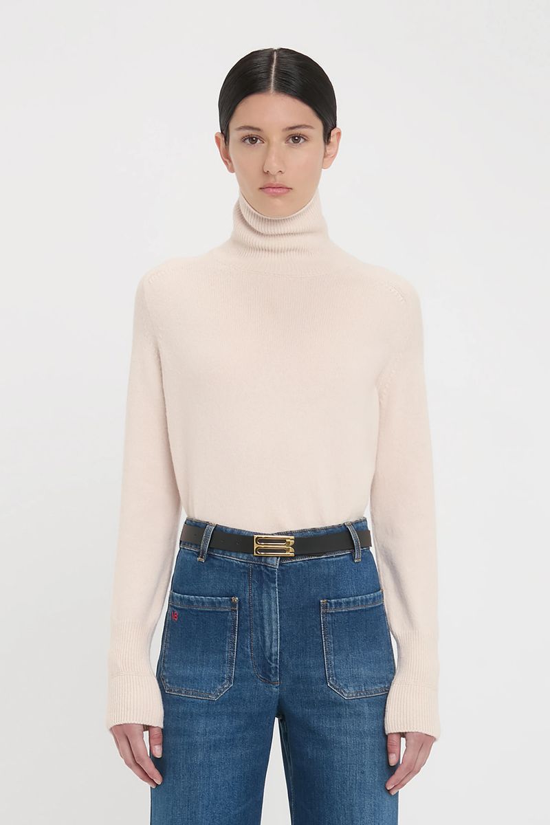 Elfenbeinfarbener Rollkragenpullover aus Lammswolle