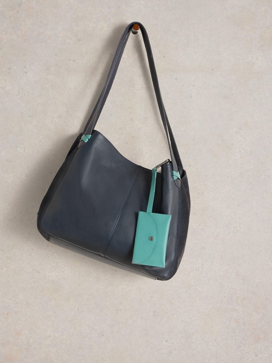 Marineblaue Schultertasche aus Leder mit Etui
