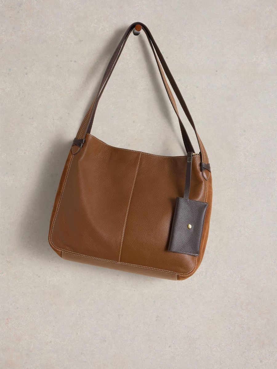 Marineblaue Schultertasche aus Leder mit Etui