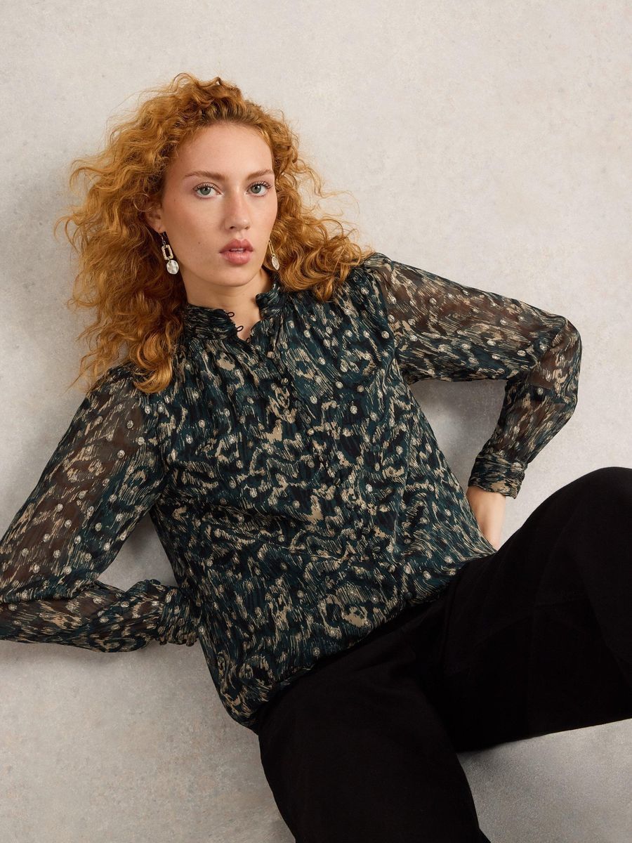 Transparente, langärmlige Bluse mit Glitzerpunkten
