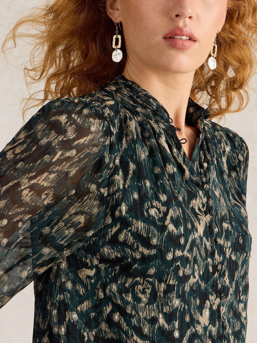 Transparente, langärmlige Bluse mit Glitzerpunkten