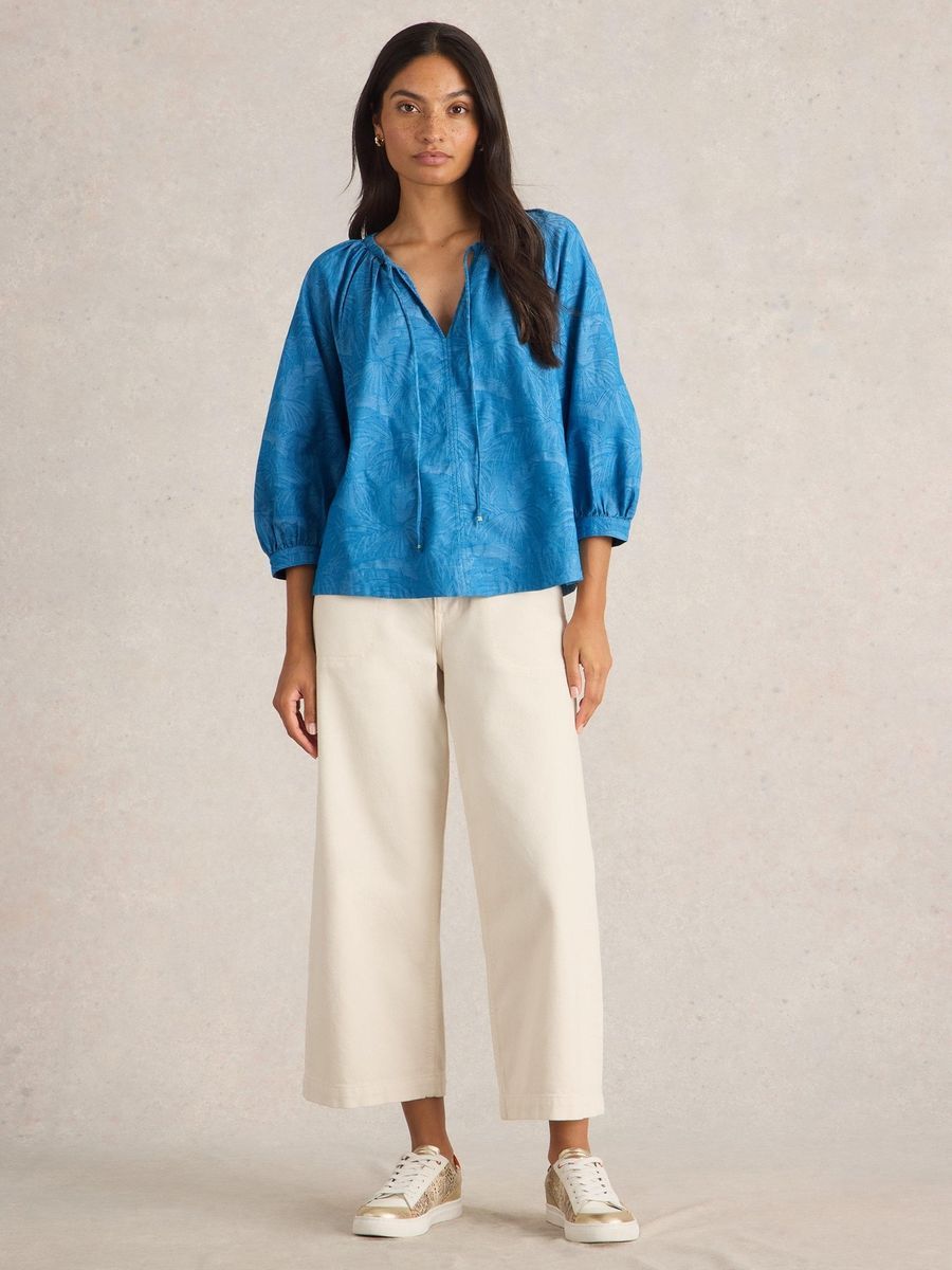 Blaue Bluse mit Muster und Bindeband