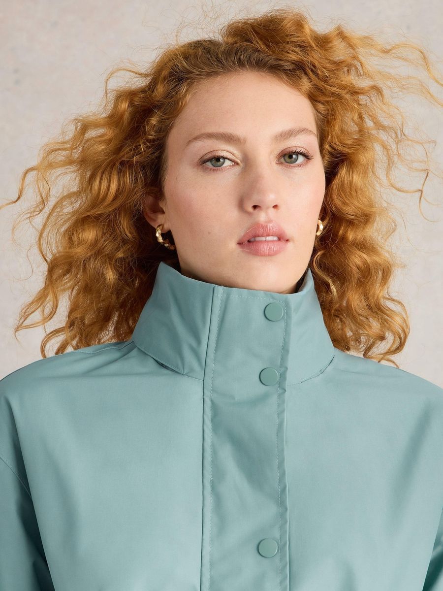 Regenjacke mit verstellbarer Taille und Kapuze