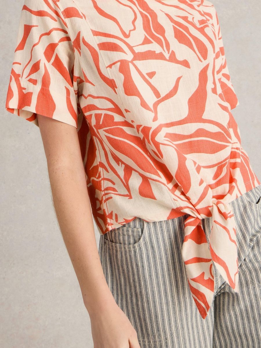 Top mit botanischem Print und Knotendetail