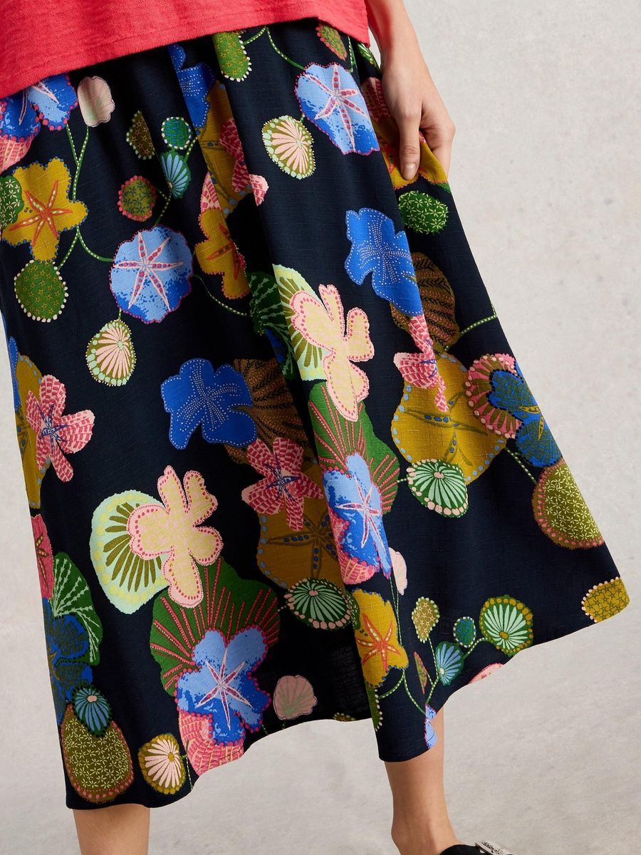 Fließender Midirock mit Blumenmuster