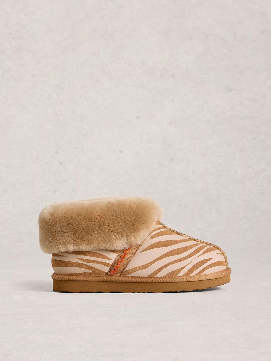 Wildleder-Hausschuhe mit Zebraprint und Shearling-Futter