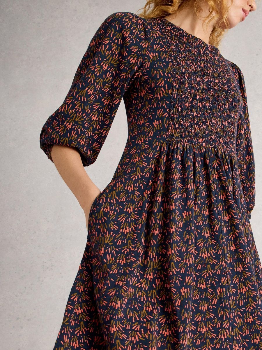 Jerseykleid mit Smok-Einsatz und Blumendruck